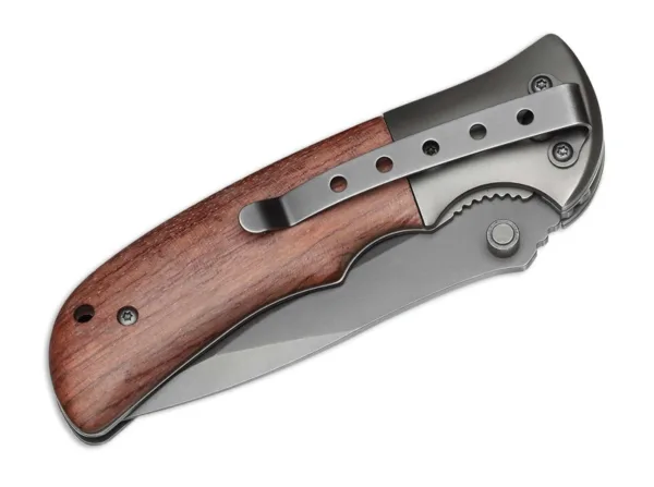 Nóż Magnum Co-Operator Stal klingi 440A, długość klingi 87 mm, długość całkowita 200 mm, rękojeść drewno Huali, klips do paska, blokada liner-lock, waga 158 g, grubość klingi 2,7 mm.