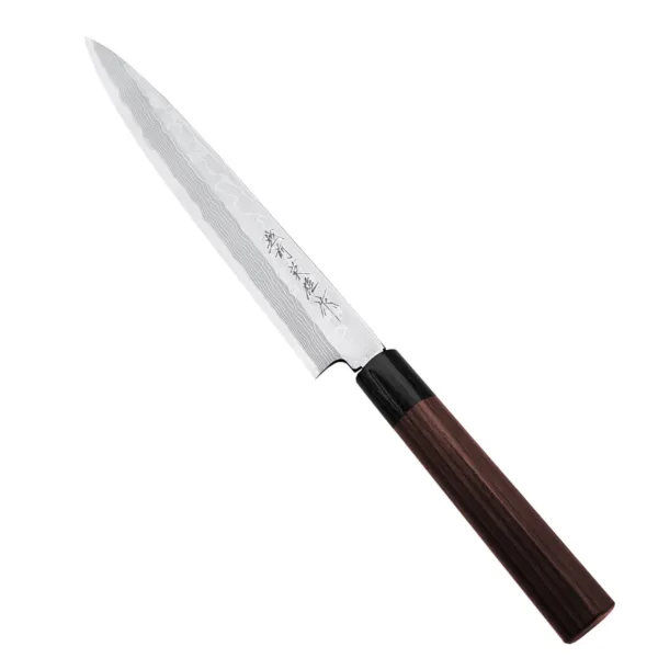 Hideo Kitaoka Nóż Shirogami Satin Yanagi 24 cm leworęczny Hideo Kitaoka Nóż kuchenny Shirogami Satin Yanagi 24 cm
Klasyczny japoński nóż kuchenny do plastrowania o długim, wąskim i cienkim ostrzu w kształcie liścia wierzby, przeznaczony do cięcia surowych filetów rybnych na cieniutkie, niemal przezroczyste plastry. Doskonale się sprawdza podczas przygotowywania sashimi, rybnego carpaccio oraz różnych wariantów sushi. Nożem Yanagi najlepiej wykonywać jednostajny ruch w jednym kierunku: do siebie. W tym modelu krawędź grzbietu ma szlif ukośny, co zwiększa wygodę przy prowadzeniu noża palcem wskazującym.
Dane techniczne:
Ostrze - stal 11 warstwowa rdzewna stal, rdzeń - #2 ShirogamiRękojeść - drewno różaneTwardość - 61-63 HRCDługość całkowita - 37,6 cmDługość ostrza - 24 cmSzerokość klingi - 3,4 cmGrubość klingi - 3,8 mmSposób ostrzenia - jednostronny leworęcznyWaga - ok. 149 g