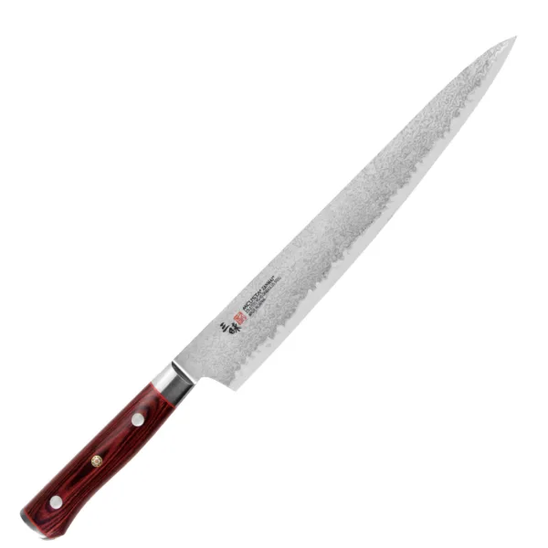 Mcusta Zanmai VG-10 Pro Flame Nóż Sujihiki 27cm Mcusta Zanmai Pro Flame Nóż Sujihiki 27cm
Nóż kuchenny przeznaczony do porcjowania i plastrowania mięs, np. drobiu, pieczeni, szynki – po ugotowaniu lub upieczeniu produktu. Specjalistyczne, wydłużone ostrze, które jest znacznie węższe i cieńsze niż w zwykłych nożach, pozwala ciąć przez całą płaszczyznę dokładnie i płynnie, podczas gdy grubszy nóż często się klinuje i szarpie mięso.
Dane techniczne:
Ostrze - 33 warstwowa stal Rdzeń VG-10Rękojeść - czerwone laminowane pakka woodTwardość - 61 HRC +/- 1Długość całkowita - 41,1 cmDługość ostrza - 27,0 cmSzerokość klingi - 4,0 cmGrubość klingi - 1,7 mmSposób ostrzenia - szlif dwustronny symetrycznyWaga - ok. 168 g