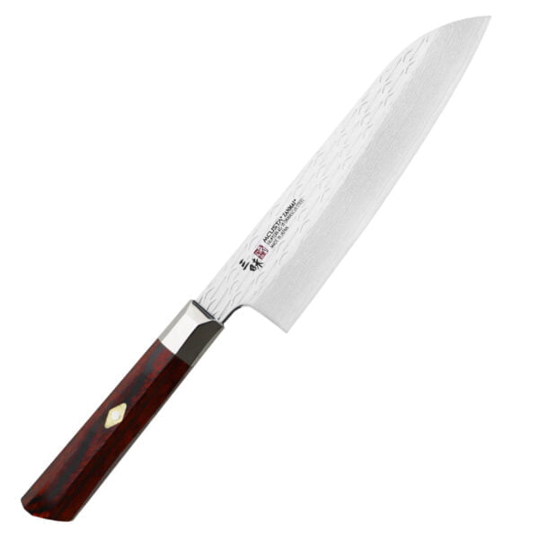 Mcusta Zanmai VG-10 Supreme Ripple Nóż Santoku 18cm Mcusta Zanmai Pro Flame Nóż Santoku 18cm
Wielofunkcyjny japoński nóż kuchenny, przeznaczony do krojenia warzyw, mięsa i ryb. Posiada obniżony czubek, który znacznie ułatwia szatkowanie, oraz szerokie ostrze, na które można zgarnąć pokrojone produkty, żeby je przenieść np. do sałatki. Doskonale się sprawdza w każdych warunkach pracy, ponieważ dzięki wysoko położonej rękojeści palce nie dotykają deski ani jedzenia.
Dane techniczne:
Ostrze - 33 warstwowa stal Rdzeń VG-10Rękojeść - oktagonalna drewno pakkaTwardość - 61 HRC +/- 1Długość całkowita - 31,8 cmDługość ostrza - 18,0 cmSzerokość klingi - 4,5 cmGrubość klingi - 2,0 mmSposób ostrzenia - szlif dwustronny symetrycznyWaga - ok. 167 g